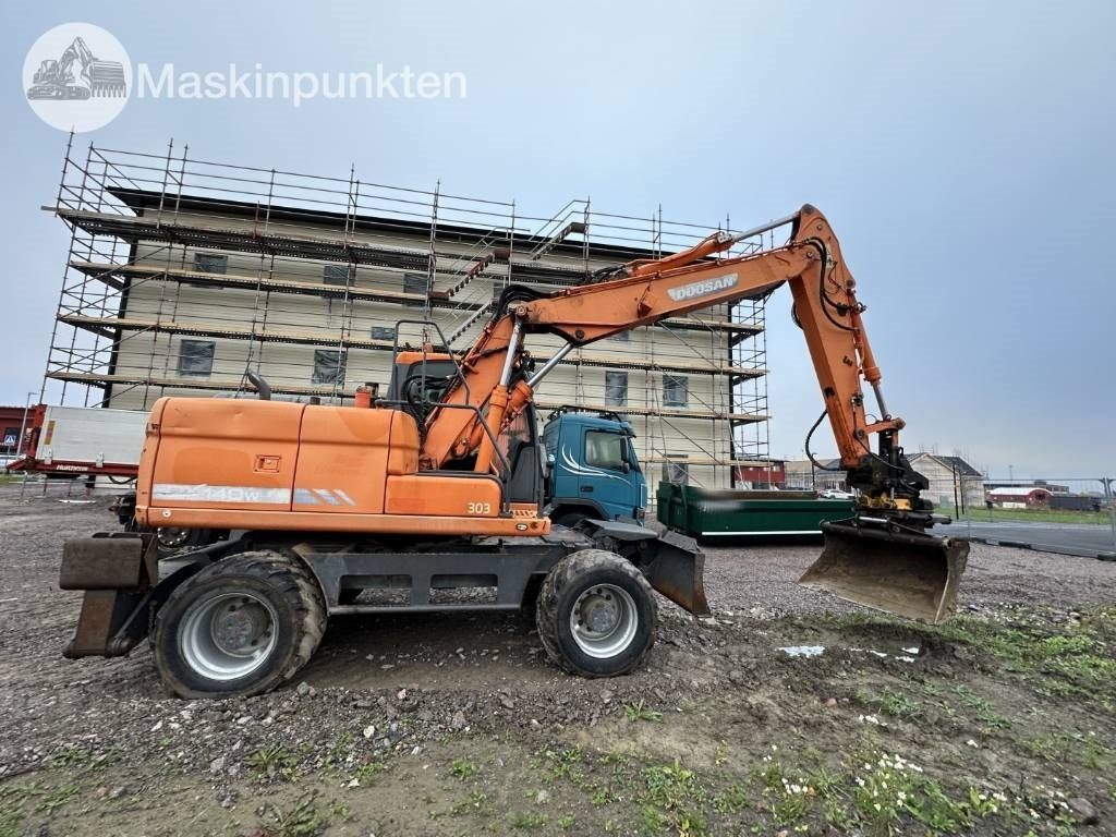 Doosan DX 140 W med vagn och redskap  - Excavadora de ruedas: foto 3 Doosan DX 140 W med vagn och redskap  - Excavadora de ruedas: foto 3