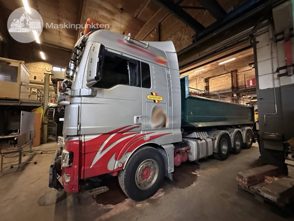 MAN TGX 35.540  - Camión multibasculante: foto 1 MAN TGX 35.540  - Camión multibasculante: foto 1