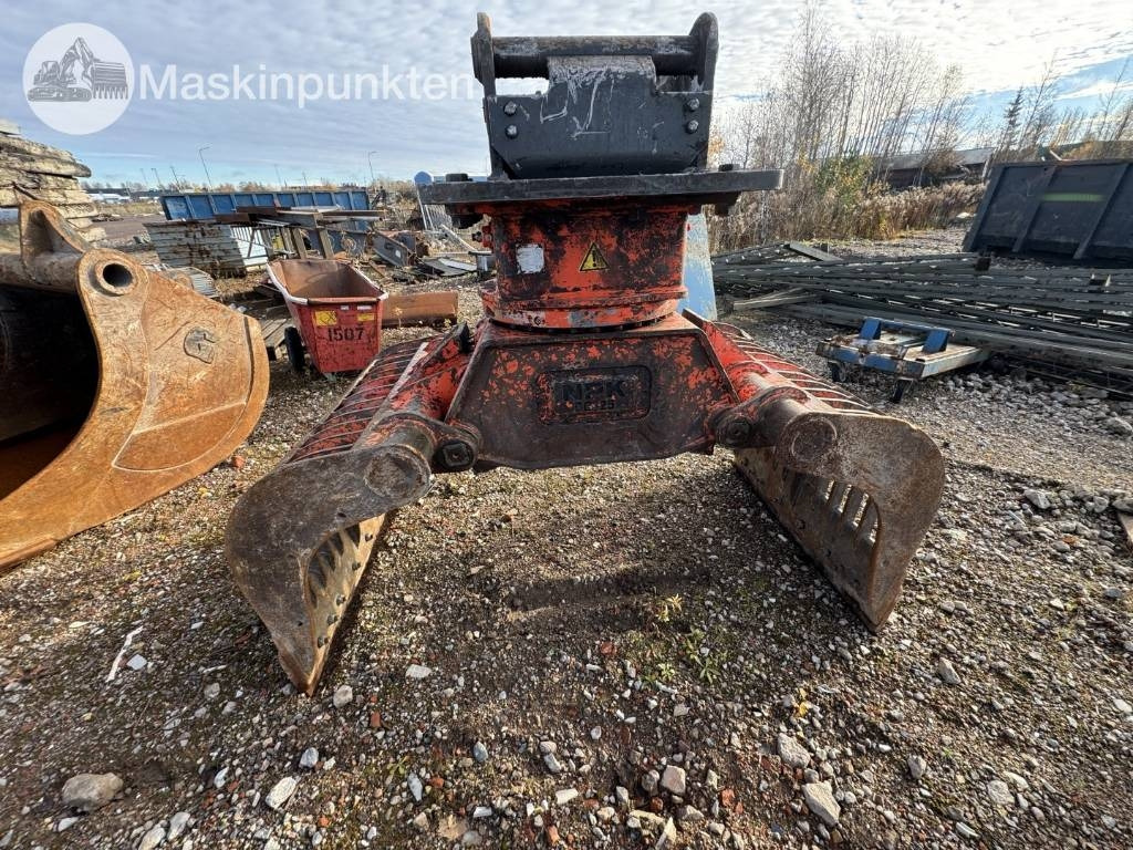 NPK DC-25 - Pinza de manipulación para Maquinaria de construcción: foto 1 NPK DC-25 - Pinza de manipulación para Maquinaria de construcción: foto 1