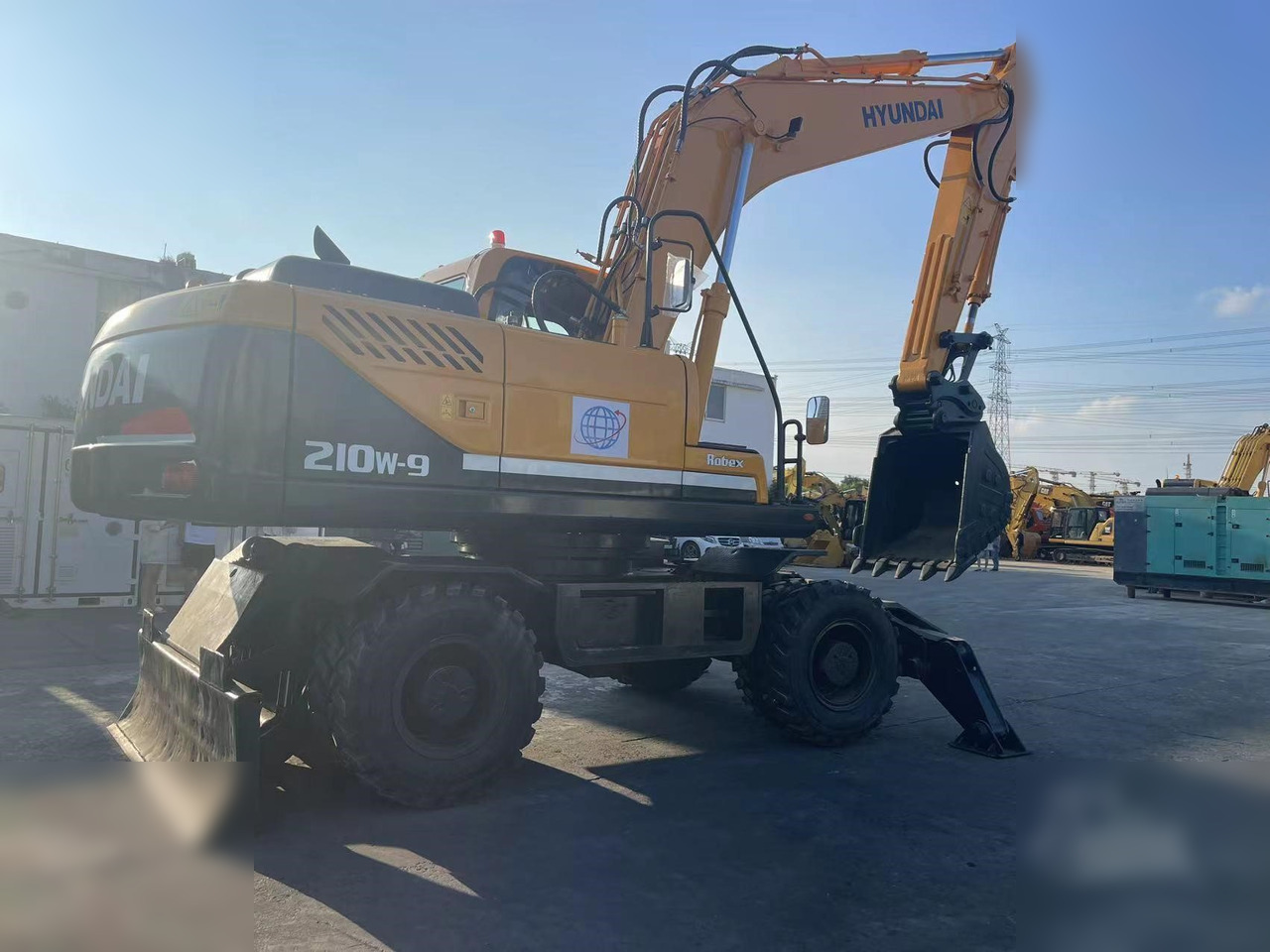 HYUNDAI ROBEX 210W-9 - Excavadora de ruedas: foto 2 HYUNDAI ROBEX 210W-9 - Excavadora de ruedas: foto 2