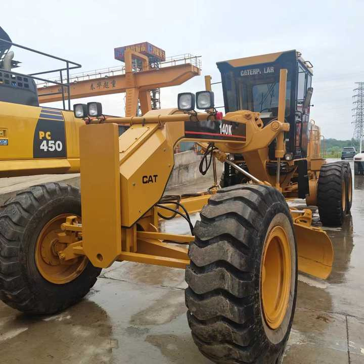 Used Cat 140K New Model Grader Popular Brand Japan Cat Hydraulic Machinery Construction Equipment - Grader: foto 1 Used Cat 140K New Model Grader Popular Brand Japan Cat Hydraulic Machinery Construction Equipment - Grader: foto 1