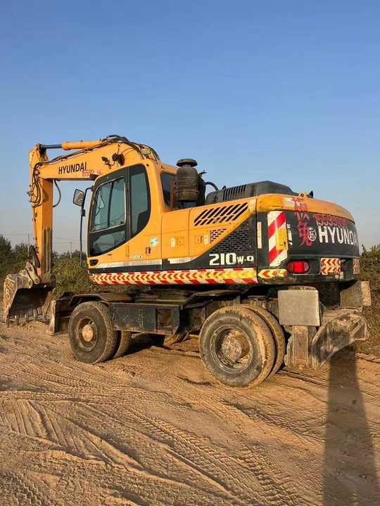 Well-Maintained Hyundai 210-9Used Wheel Excavator Construction Machine | No Major Repairs | Price Negotiable - Excavadora de ruedas: foto 2 Well-Maintained Hyundai 210-9Used Wheel Excavator Construction Machine | No Major Repairs | Price Negotiable - Excavadora de ruedas: foto 2