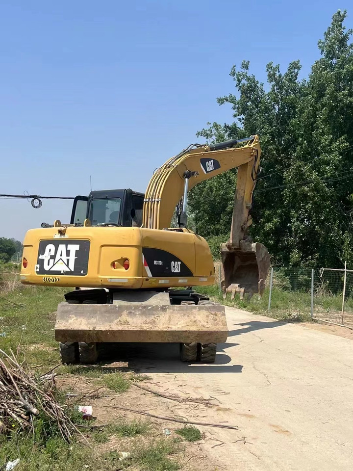 CATERPILLAR M317 - Excavadora de ruedas: foto 2 CATERPILLAR M317 - Excavadora de ruedas: foto 2