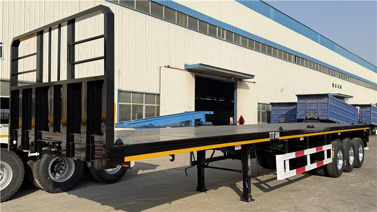 TITAN 12.5M 3 Axle Flat Deck Trailer for Sale In Tanzania - Semirremolque portacontenedore/ Intercambiable: foto 2 TITAN 12.5M 3 Axle Flat Deck Trailer for Sale In Tanzania - Semirremolque portacontenedore/ Intercambiable: foto 2