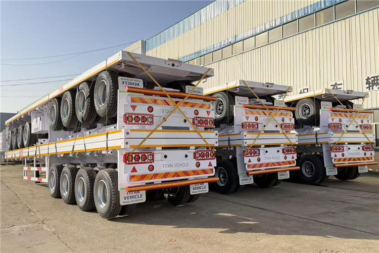 TITAN 4 Axle Flatbed Trailer for Sale In Saudi Arabia - Semirremolque plataforma/ Caja abierta: foto 1 TITAN 4 Axle Flatbed Trailer for Sale In Saudi Arabia - Semirremolque plataforma/ Caja abierta: foto 1