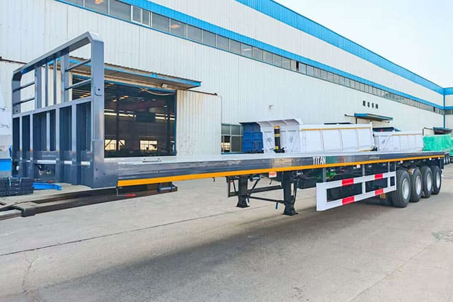 TITAN 4 Axle Flatbed Trailer for Sale in Zimbabwe - Semirremolque plataforma/ Caja abierta: foto 1 TITAN 4 Axle Flatbed Trailer for Sale in Zimbabwe - Semirremolque plataforma/ Caja abierta: foto 1