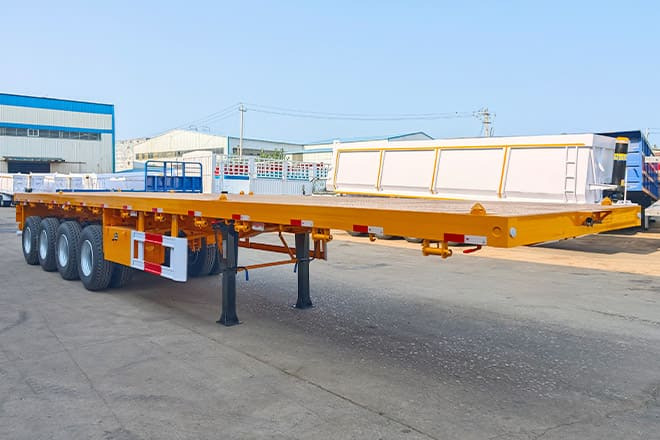 TITAN 4 Axle Heavy Duty Flatbed Trailer for Sale in Mali - Semirremolque plataforma/ Caja abierta: foto 1 TITAN 4 Axle Heavy Duty Flatbed Trailer for Sale in Mali - Semirremolque plataforma/ Caja abierta: foto 1