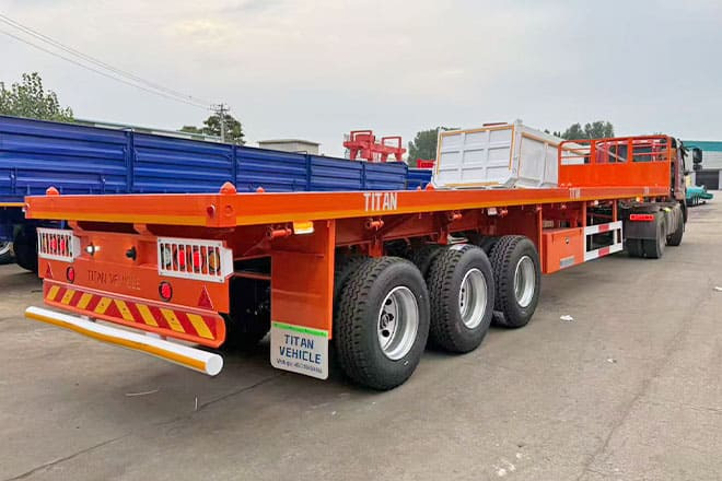 TITAN 40Ft Flatbed Trailer for Sale Price in Jamaica - Semirremolque plataforma/ Caja abierta: foto 2 TITAN 40Ft Flatbed Trailer for Sale Price in Jamaica - Semirremolque plataforma/ Caja abierta: foto 2