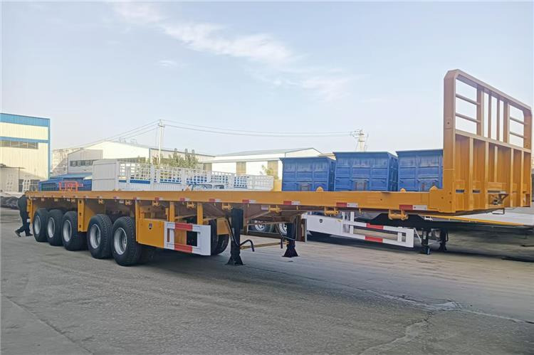 TITAN 5 Axle 13M Flatbed Trailer Price for Sale In Zimbabwe - Semirremolque plataforma/ Caja abierta: foto 1 TITAN 5 Axle 13M Flatbed Trailer Price for Sale In Zimbabwe - Semirremolque plataforma/ Caja abierta: foto 1