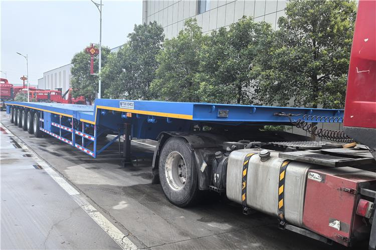 TITAN 6 Axle 54m Telescopic Flatbed Trailer for Sale In Angola - Semirremolque plataforma/ Caja abierta: foto 3 TITAN 6 Axle 54m Telescopic Flatbed Trailer for Sale In Angola - Semirremolque plataforma/ Caja abierta: foto 3