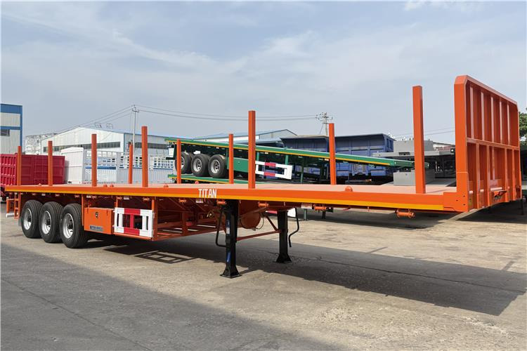TITAN Container Flatbed Truck Trailer with Piles In Angola - Semirremolque portacontenedore/ Intercambiable: foto 1 TITAN Container Flatbed Truck Trailer with Piles In Angola - Semirremolque portacontenedore/ Intercambiable: foto 1