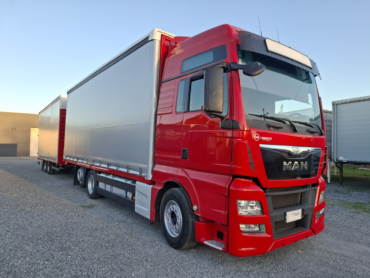 MAN TGX 26.440 E6 + SCHMITZ - Camión lona: foto 4 MAN TGX 26.440 E6 + SCHMITZ - Camión lona: foto 4