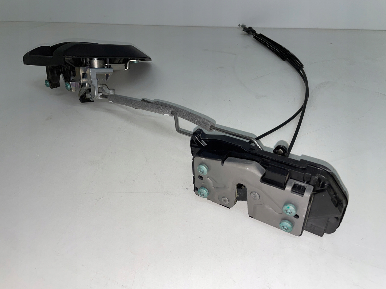 LEWY CENTRALNY ZAMEK , KLAMKA LINKA MAN TGS TGX TGL TGM 3 TG3 - Puerta y piezas para Camión: foto 1 LEWY CENTRALNY ZAMEK , KLAMKA LINKA MAN TGS TGX TGL TGM 3 TG3 - Puerta y piezas para Camión: foto 1