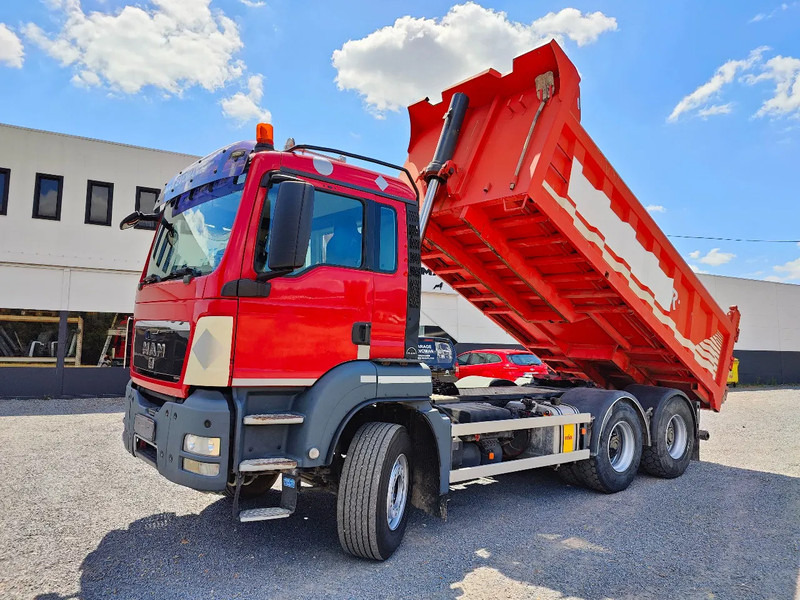 MAN TGS 33.440 6x4 kipper / trekker Euro 5 - Camión volquete: foto 1 MAN TGS 33.440 6x4 kipper / trekker Euro 5 - Camión volquete: foto 1
