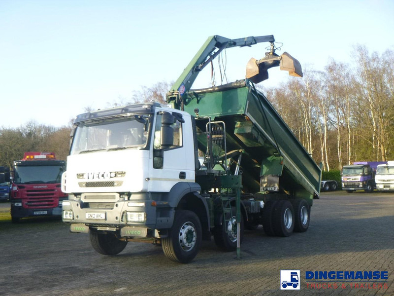 Iveco AD340T36 8x4 RHD tipper + HMF 1244 Z1 - Camión grúa: foto 1 Iveco AD340T36 8x4 RHD tipper + HMF 1244 Z1 - Camión grúa: foto 1