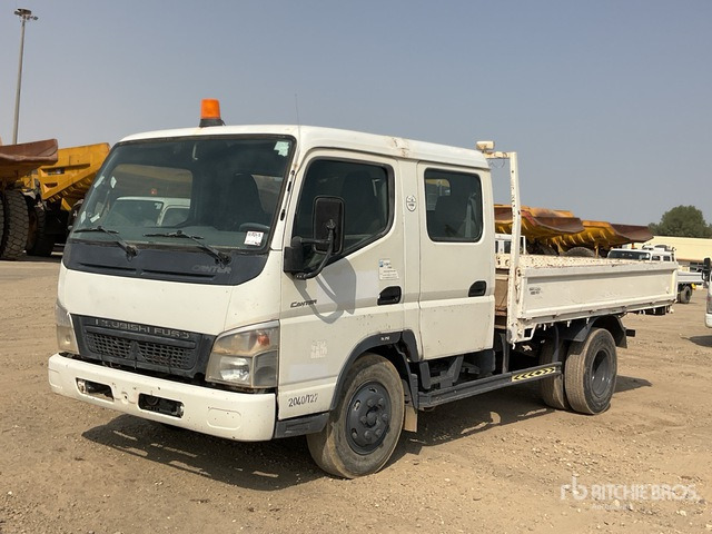 2010 Mitsubishi Canter 4x2 Crew Cab Flatbed Truck - Camión caja abierta: foto 1 2010 Mitsubishi Canter 4x2 Crew Cab Flatbed Truck - Camión caja abierta: foto 1