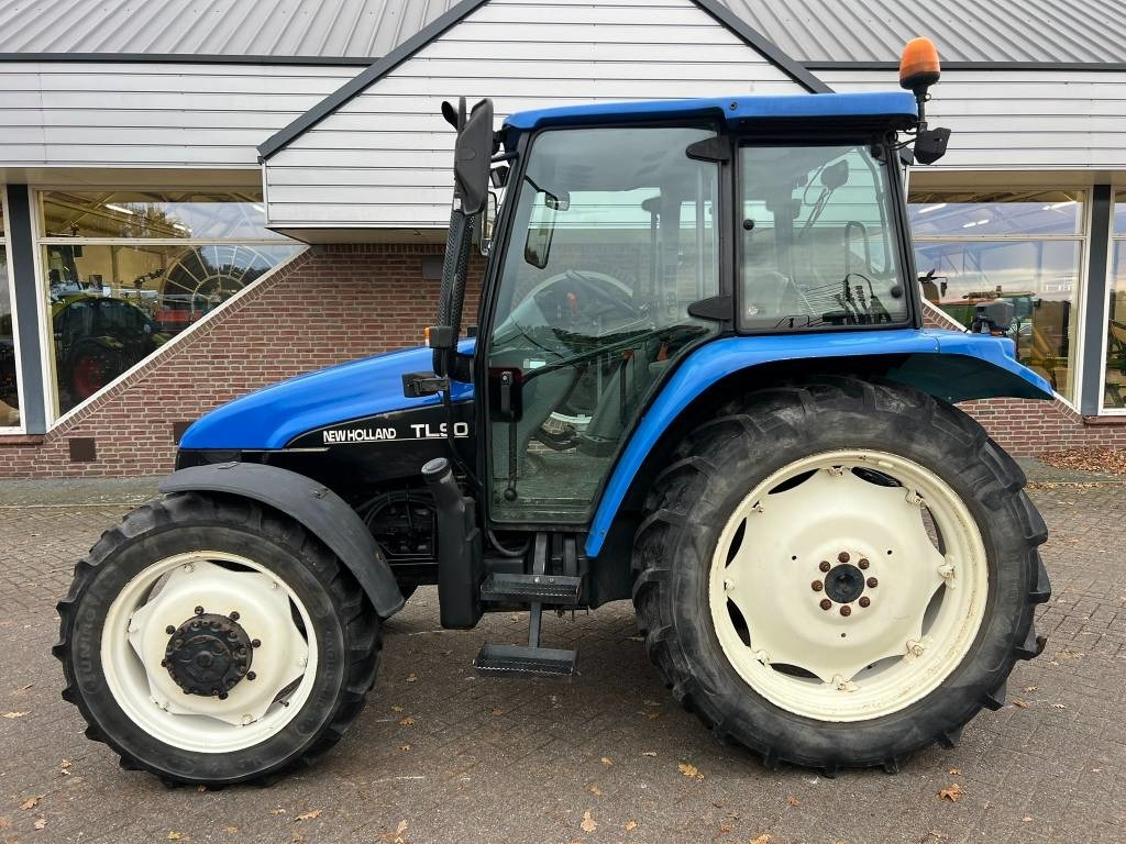 New Holland TL 90 trekker - Tractor: foto 2 New Holland TL 90 trekker - Tractor: foto 2