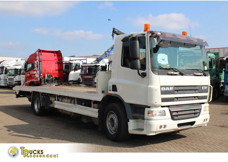 DAF CF 75.310 + HYDROLIC PLATFORM + EURO 5 + REMOTE + MANUAL - Camión portavehículos: foto 1 DAF CF 75.310 + HYDROLIC PLATFORM + EURO 5 + REMOTE + MANUAL - Camión portavehículos: foto 1