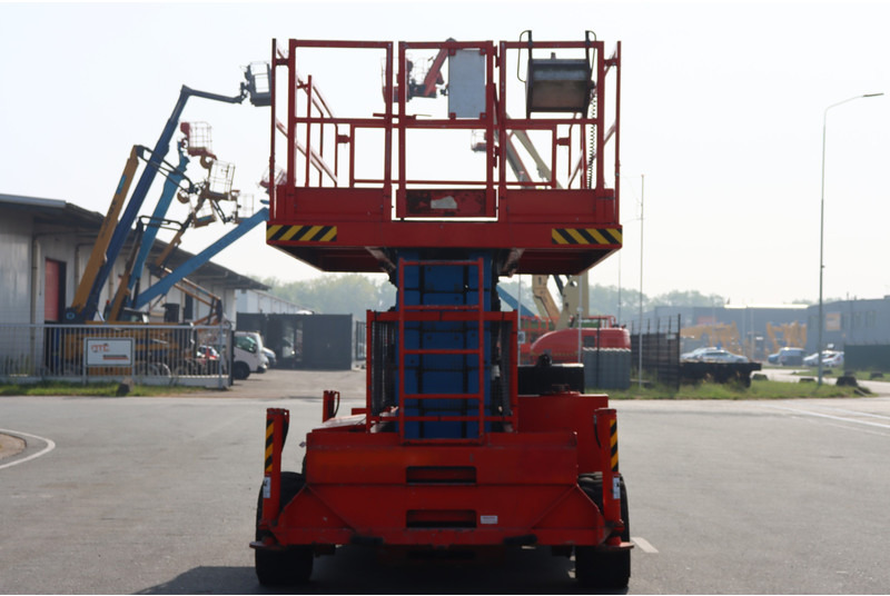 Holland lift B-195DL25 - Plataforma de tijeras: foto 3 Holland lift B-195DL25 - Plataforma de tijeras: foto 3