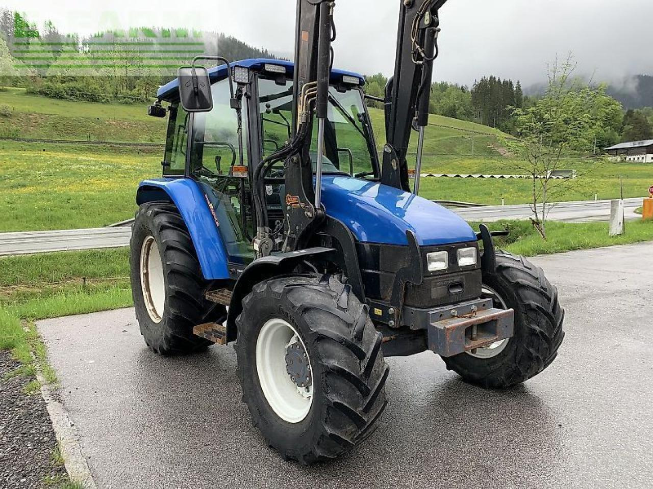 New Holland tl 70 a + hauer frontlader A - Tractor: foto 5 New Holland tl 70 a + hauer frontlader A - Tractor: foto 5