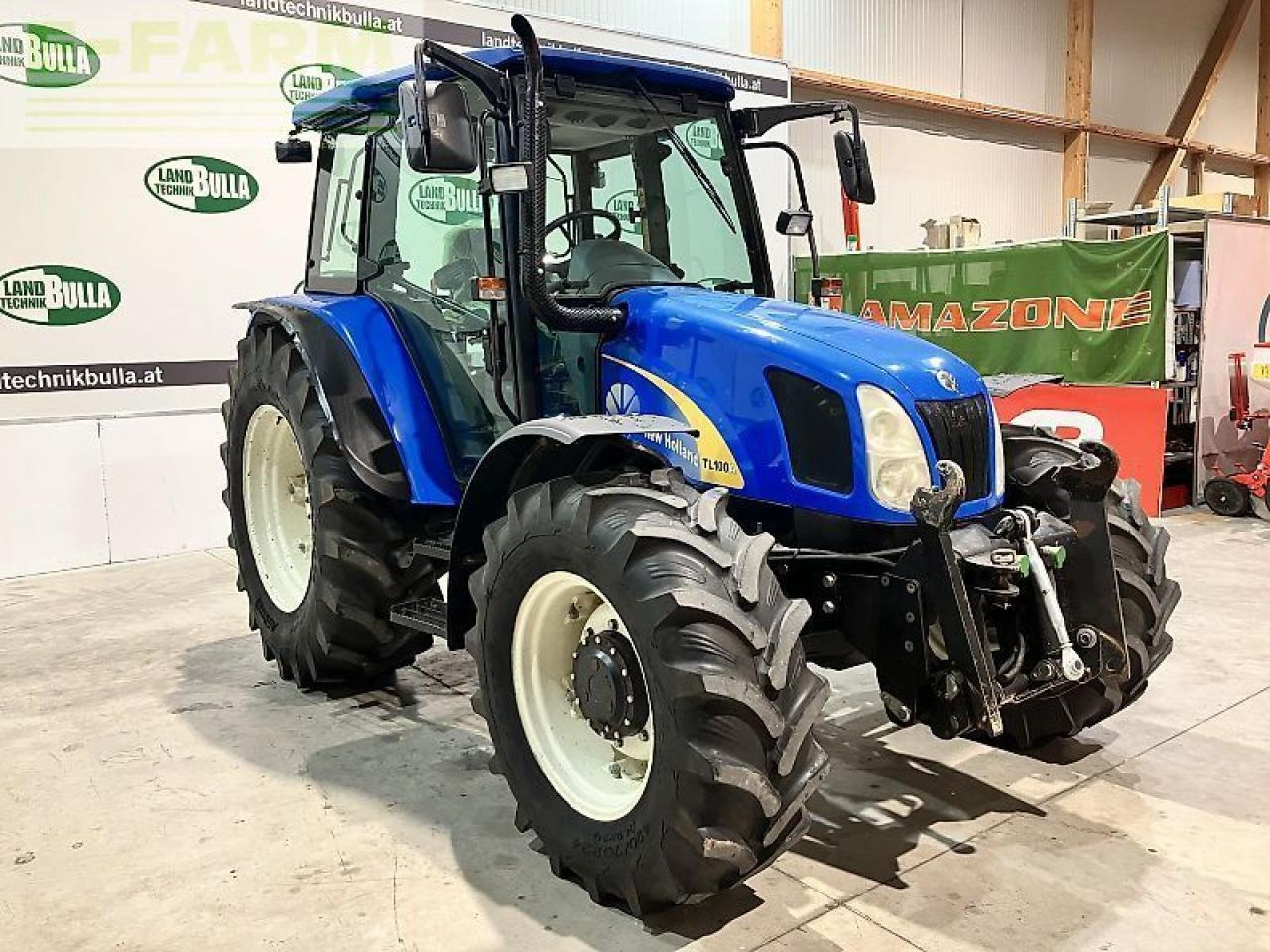 New Holland tl100a (4wd) A - Tractor: foto 2 New Holland tl100a (4wd) A - Tractor: foto 2