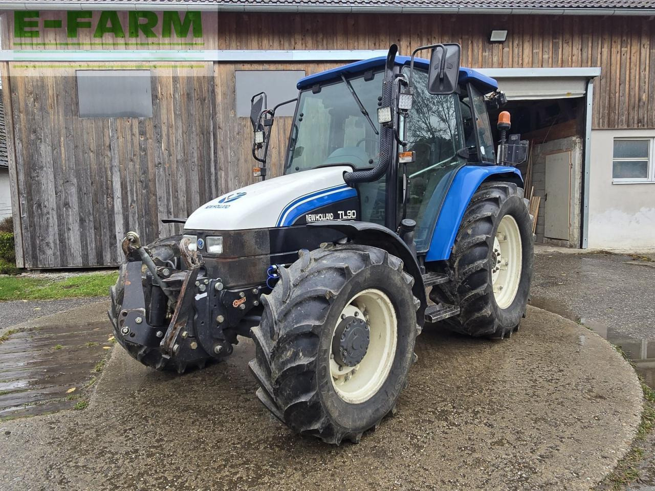 New Holland tl90a (4wd) A - Tractor: foto 1 New Holland tl90a (4wd) A - Tractor: foto 1