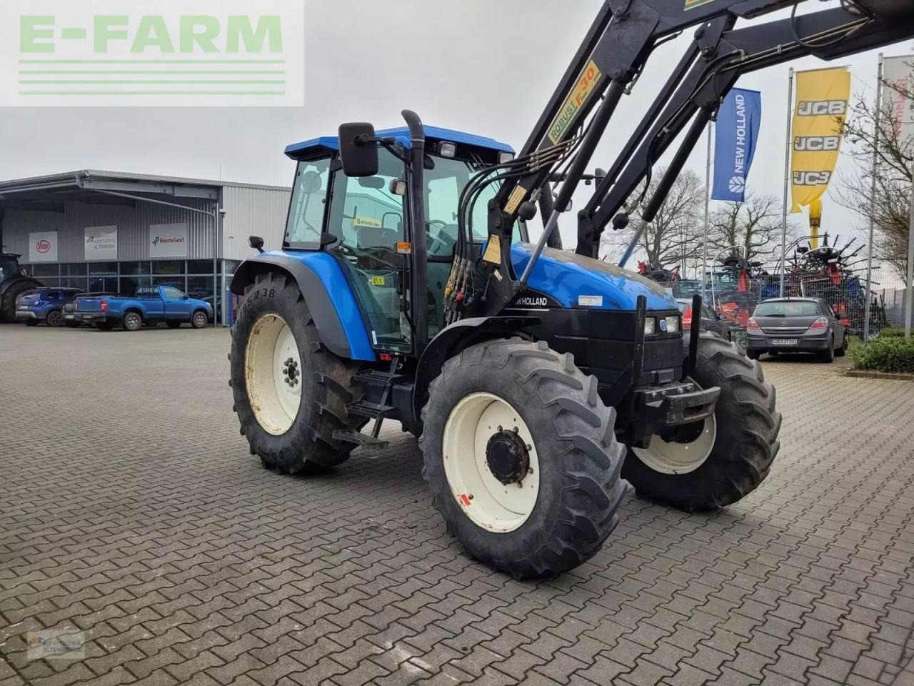 New Holland ts115 / ts 115 - Tractor: foto 2 New Holland ts115 / ts 115 - Tractor: foto 2