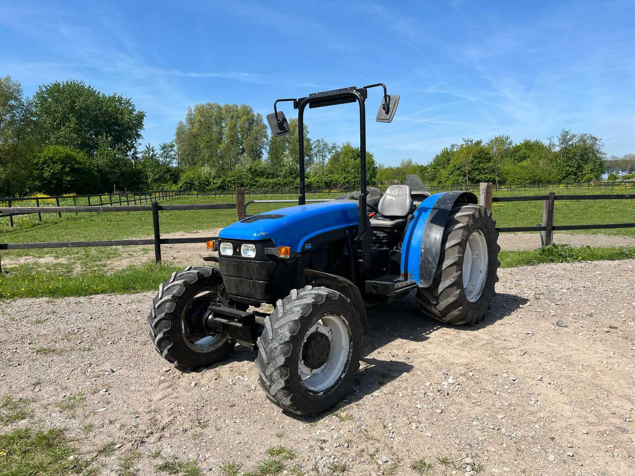 New Holland TN95F - Tractor: foto 1 New Holland TN95F - Tractor: foto 1