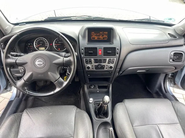 Hatchback Nissan Almera Leder bekleding APK Cruise control: foto 10 Hatchback Nissan Almera Leder bekleding APK Cruise control: foto 10
