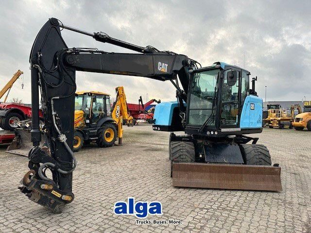 Caterpillar M315F, OilQuick, Hammer- u- Greifersteuerung - Excavadora de ruedas: foto 1 Caterpillar M315F, OilQuick, Hammer- u- Greifersteuerung - Excavadora de ruedas: foto 1