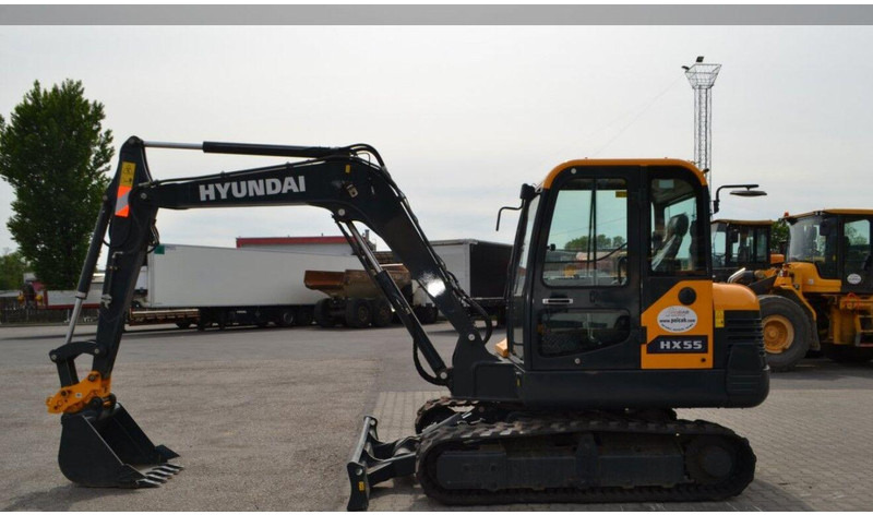 Hyundai HX55 Mini lánctalpas forgókotró - Miniexcavadora: foto 5 Hyundai HX55 Mini lánctalpas forgókotró - Miniexcavadora: foto 5