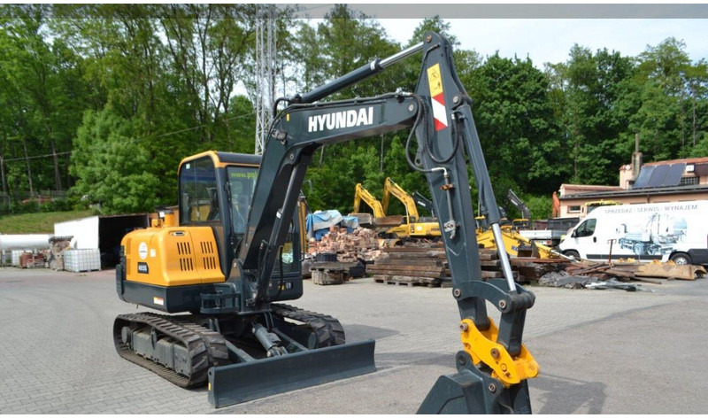 Hyundai HX55 Mini lánctalpas forgókotró - Miniexcavadora: foto 1 Hyundai HX55 Mini lánctalpas forgókotró - Miniexcavadora: foto 1