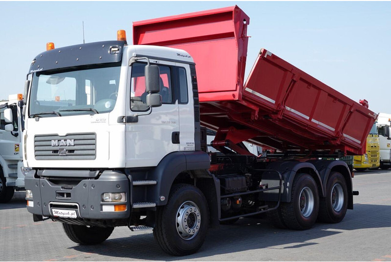 MAN TGA 33.390 / 6X4 / WYWROTKA 2 STRONNA / HYDROBURTA / MANUAL / SP - Camión volquete: foto 1 MAN TGA 33.390 / 6X4 / WYWROTKA 2 STRONNA / HYDROBURTA / MANUAL / SP - Camión volquete: foto 1