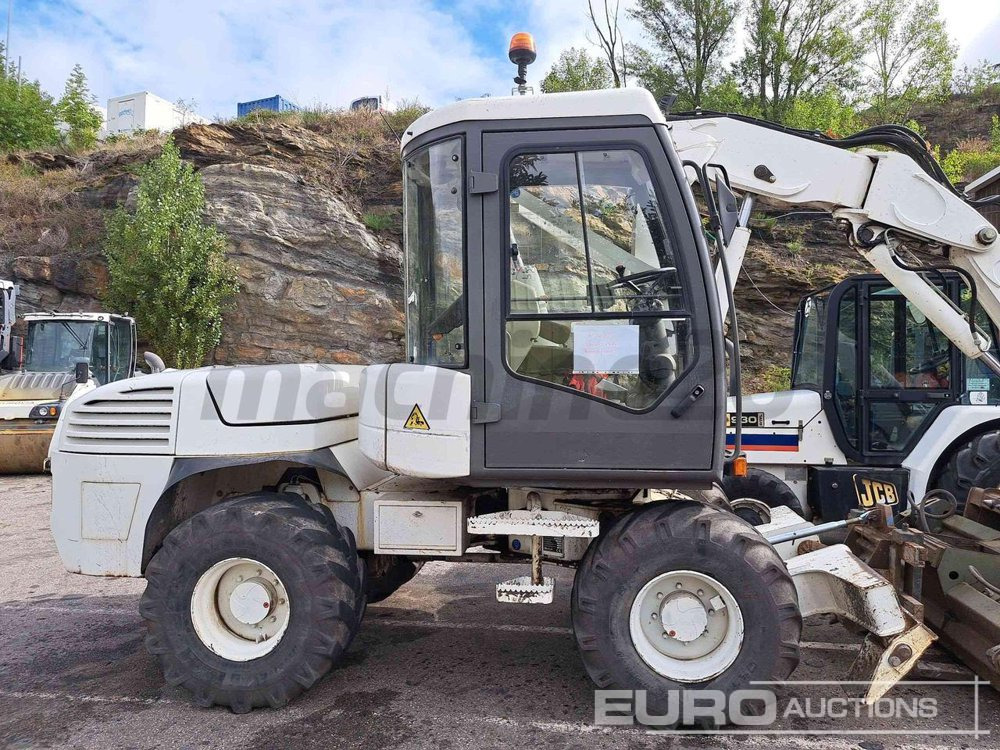 2014 Mecalac 12 MTX - Excavadora de ruedas: foto 1 2014 Mecalac 12 MTX - Excavadora de ruedas: foto 1