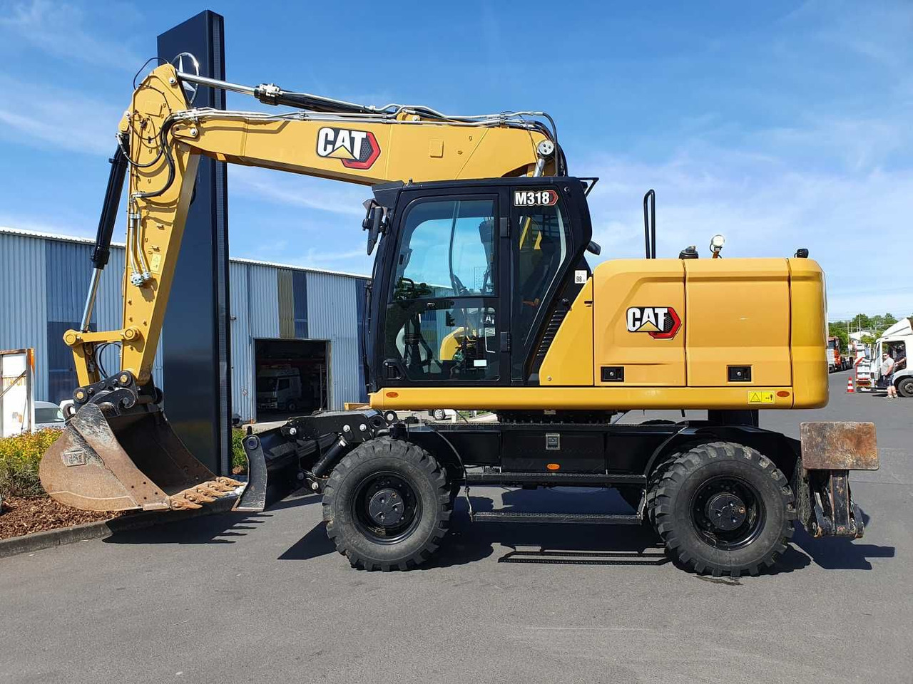 CAT M318 / 2022 / nur 286h! / Tieflöffel / Pratzen - Excavadora de ruedas: foto 2 CAT M318 / 2022 / nur 286h! / Tieflöffel / Pratzen - Excavadora de ruedas: foto 2
