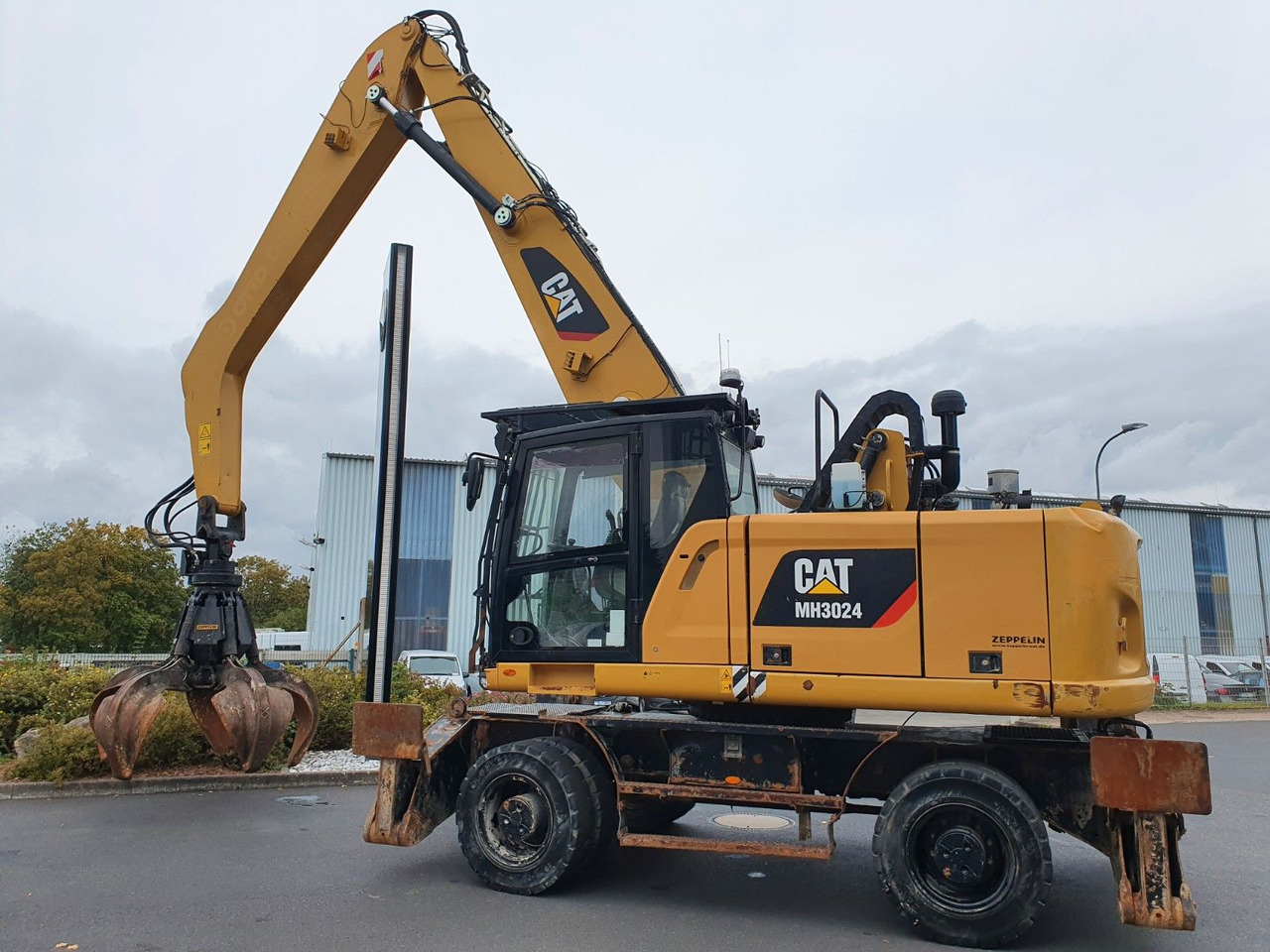 CAT MH3024 / MH 3024 / Greifer / 2018 / 9.424h - Excavadora de ruedas: foto 4 CAT MH3024 / MH 3024 / Greifer / 2018 / 9.424h - Excavadora de ruedas: foto 4