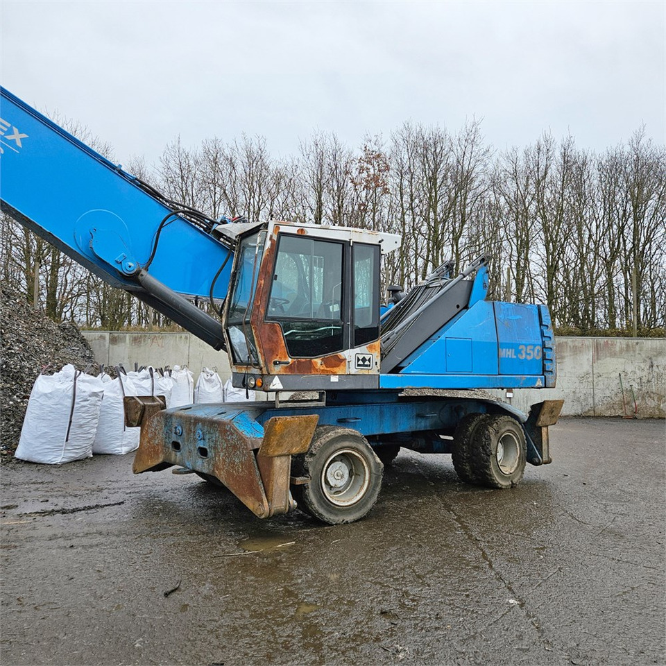 Fuchs MHL 350 D - Manipulador de materiales: foto 2 Fuchs MHL 350 D - Manipulador de materiales: foto 2
