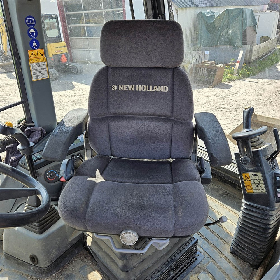 Arrendamiento de New Holland B115 B New Holland B115 B: foto 12
